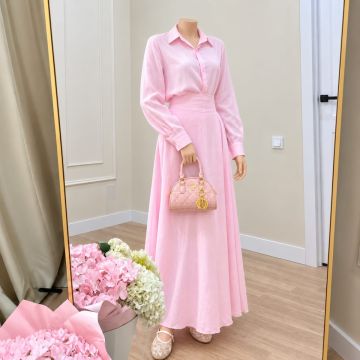 طقم نسائي أنيق من قميص وتنورة طويلة